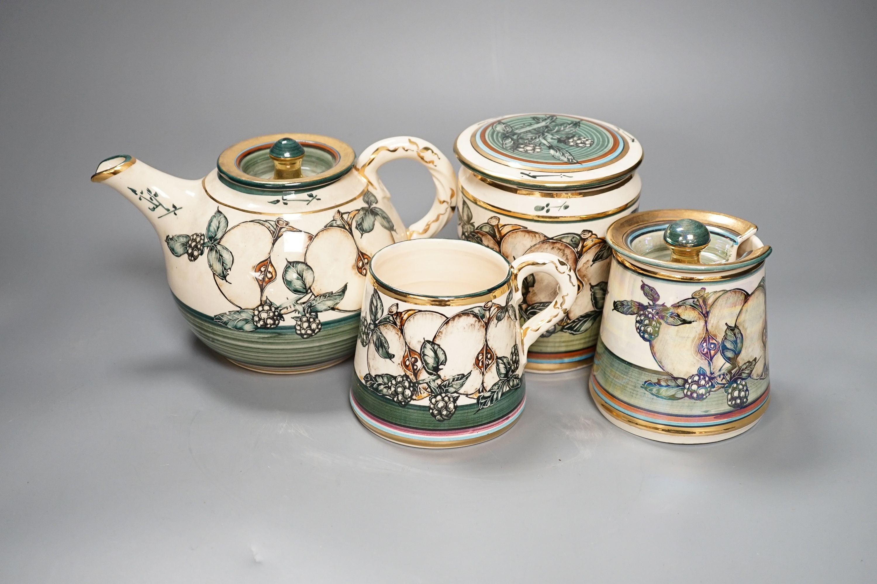 A collection of nine pieces of Lancastrian lustre ceramics, by Alvin Irving, tallest 17cm